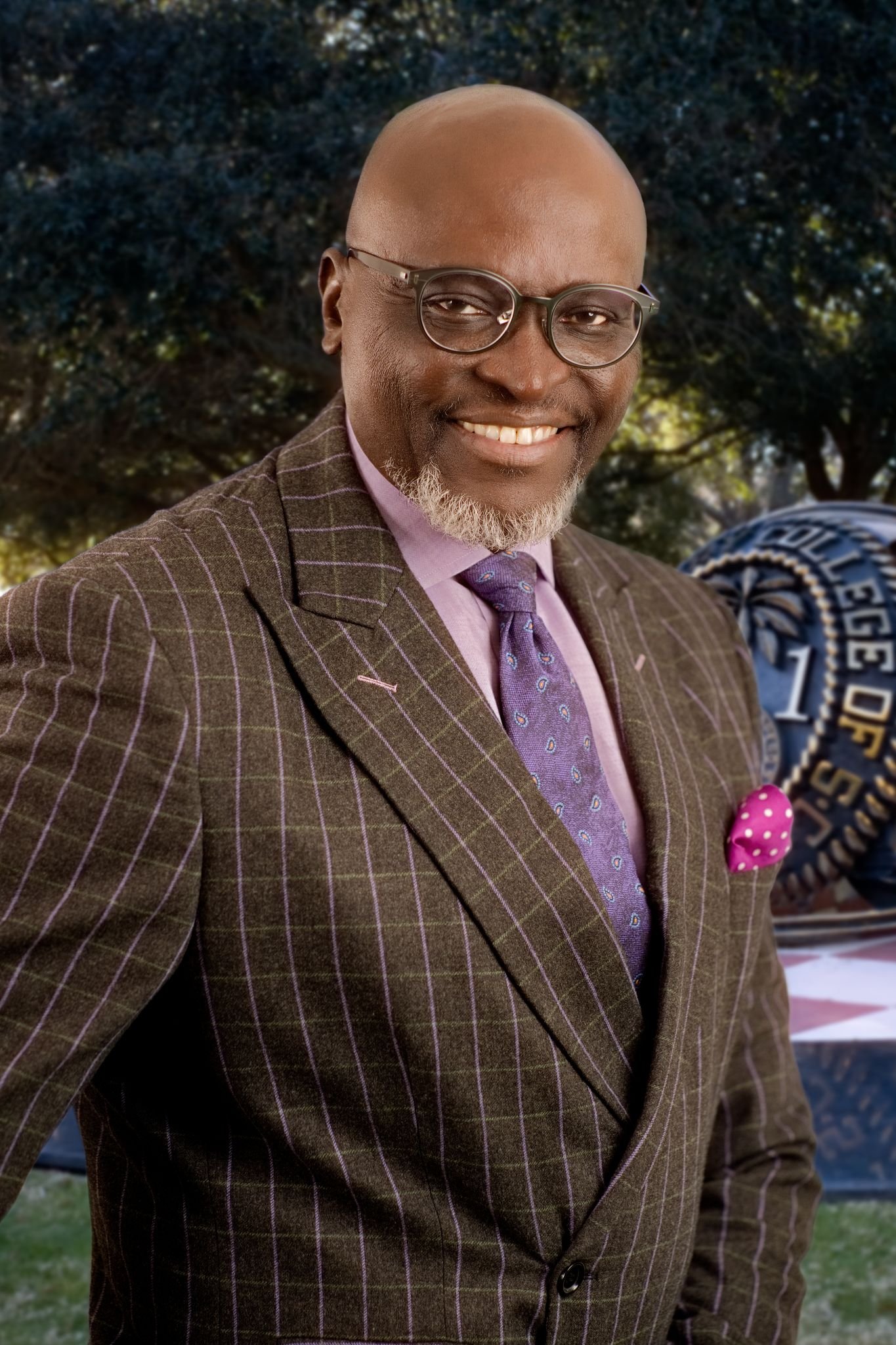 Professional headshot of  black male financial advisor, made by Paolo Portraits in Charleston SC